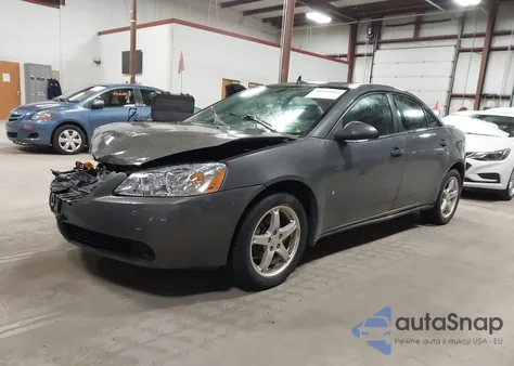 2009 Pontiac G6 z USA, uszkodzony, nr VIN 1G2ZG57N494220740